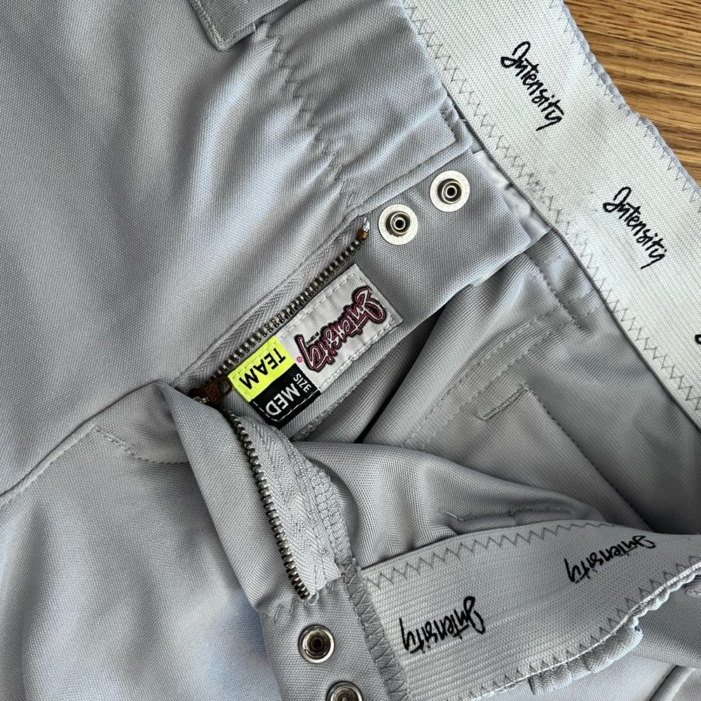 Light gray intensity, women’s softball pants, medium.